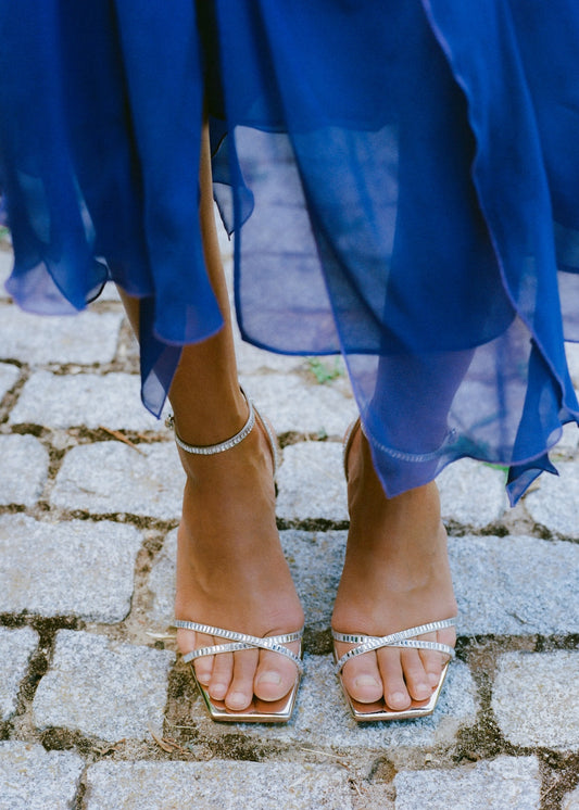 Heeled sandal with strass strap